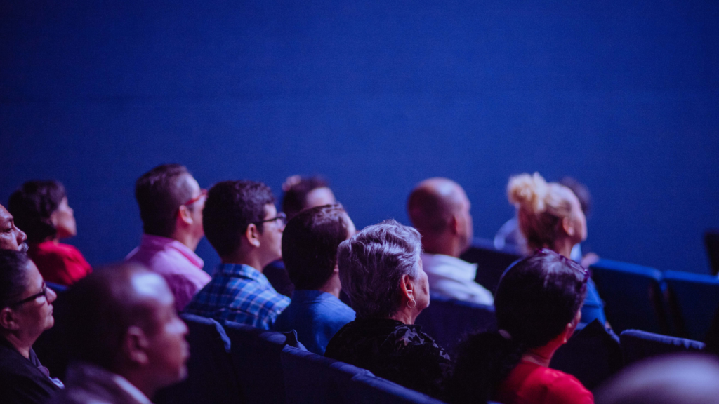 Business Professionals Attending a Technology Conference Session